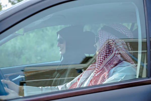 Arabic Couple Traveling By Car