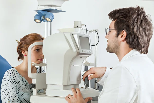 Ophthalmologist With Woman
