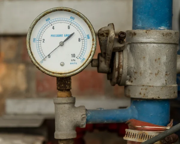 Pressure Gauge connected to Pipes