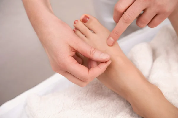 Acupuncture treatment on foot