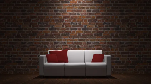 Couch in front of brick wall