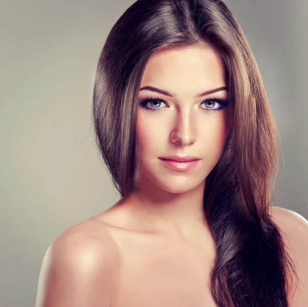 Beautiful brunette with gray eyes