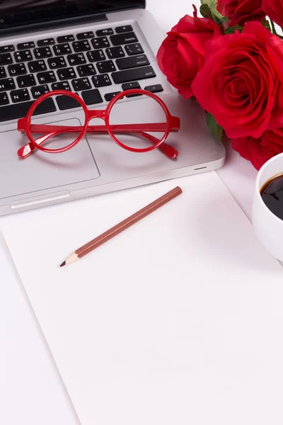 Blank paper with laptop, glasses and roses (soft color and vigne