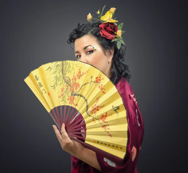 Kimono white woman holding traditional fan