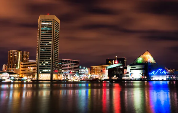 Long exposure of the colorful Baltimore skyline at night, Maryla