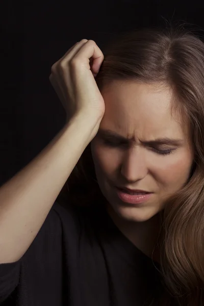 Young Woman with Headache
