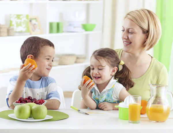 Family eating fruit it is healthy