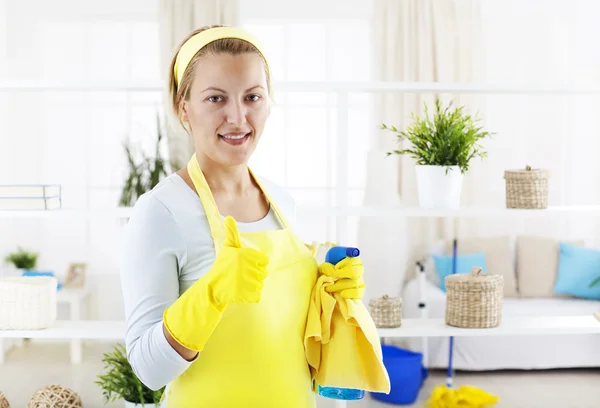 Woman with thumb up gesturing excellent cleaning work