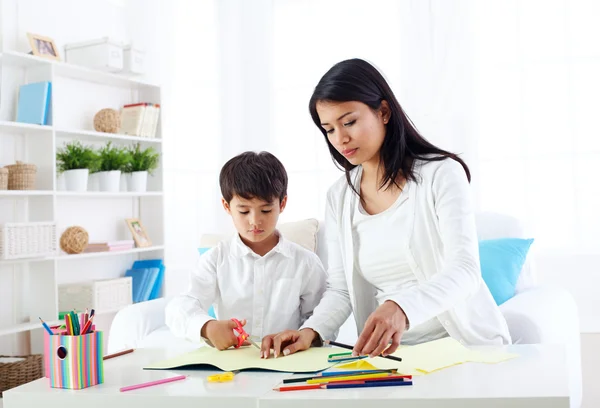 Mother and son in preschool activity