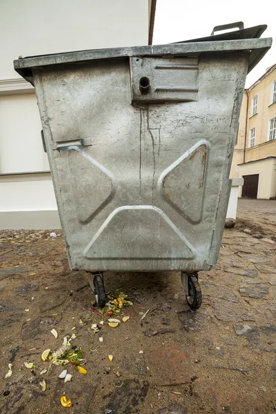 Big trash basket with leftover food.