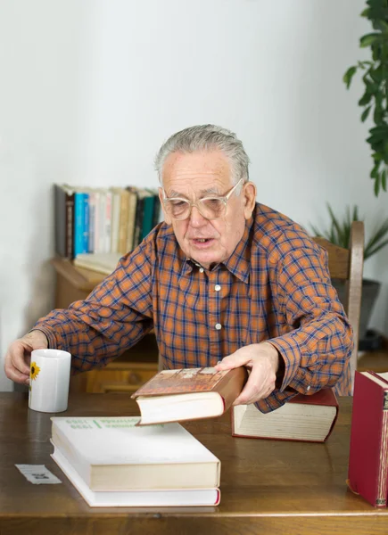 Old man with books