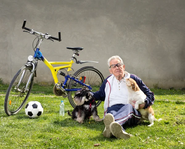 Senior man with dogs