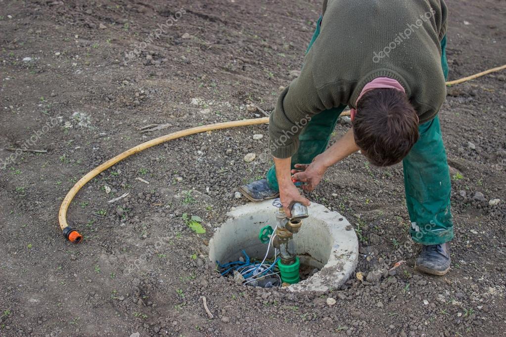 Connection garden hose on underground irrigation system 2 — Stock Photo