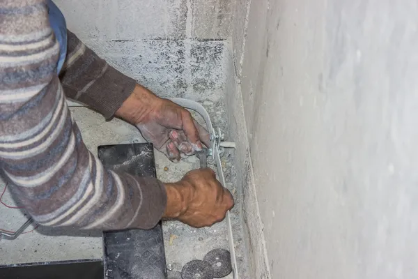 Installing grounding system in elevator shaft