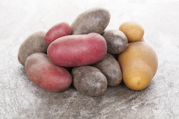 Various raw potatoes.