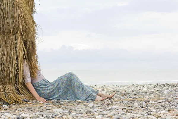 Curly blonde on sea