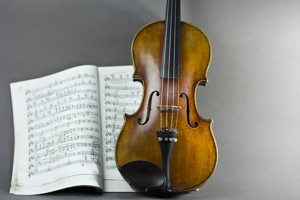 Beautiful violin on a background sheet music. musical instrument. stringed instrument. violin