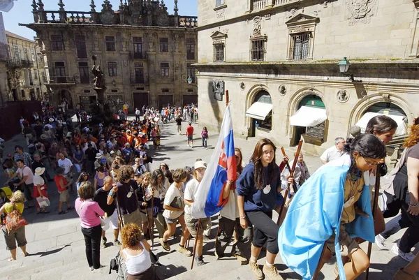Catholic pilgrims come up to St. James Cathedral on Saint James Day in Santiago, Spain.