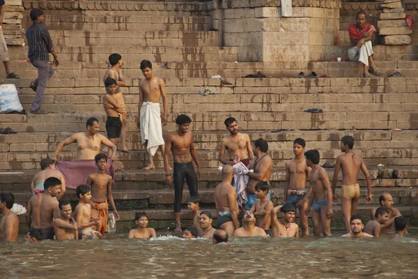 Indian people bathe in Ganga river in Varanasi, India.