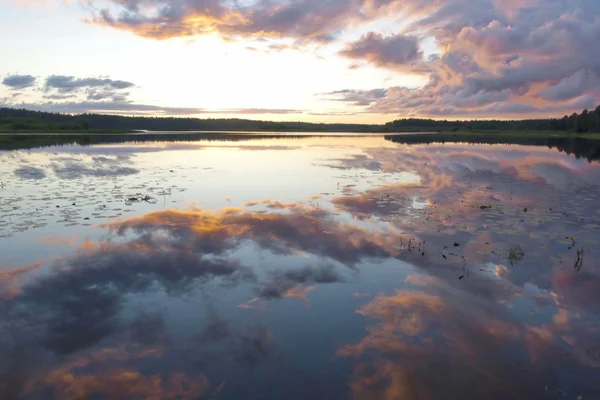 Sunset reflection in the Lake Pocha on Russian North.