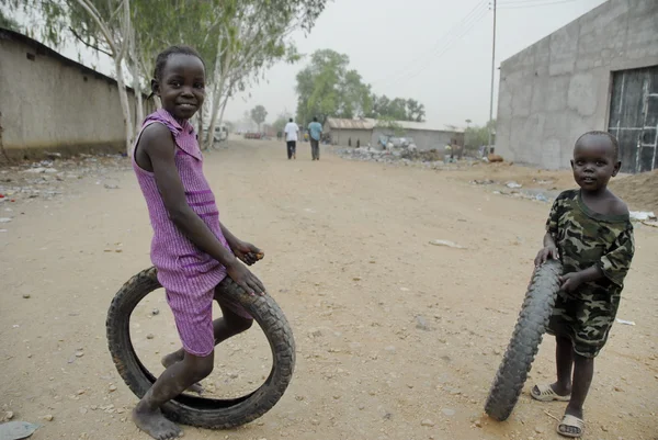 African kids play on a street in Juba, South Sudan.