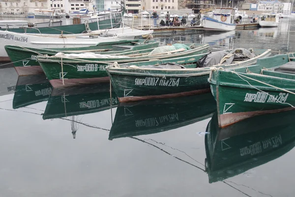 Fishing boats lined up in Balaklava, suburb of Sevastopol, Crimea, Ukraine.