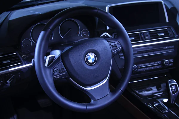 BMW motor steering wheel in a car sales shop
