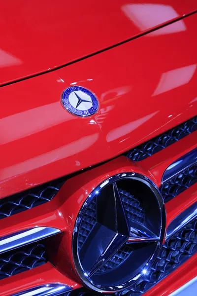 Red Benz A-class cars brand in a car sales shop, Tangshan, China