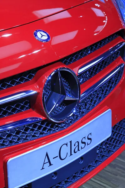 Red Benz A-class cars brand in a car sales shop, Tangshan, China