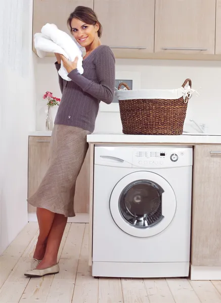 Woman on washing machine