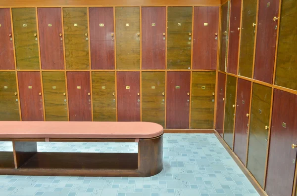 Classic wood locker room and a bench