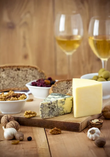 White Wine and cheese arrangement on the table