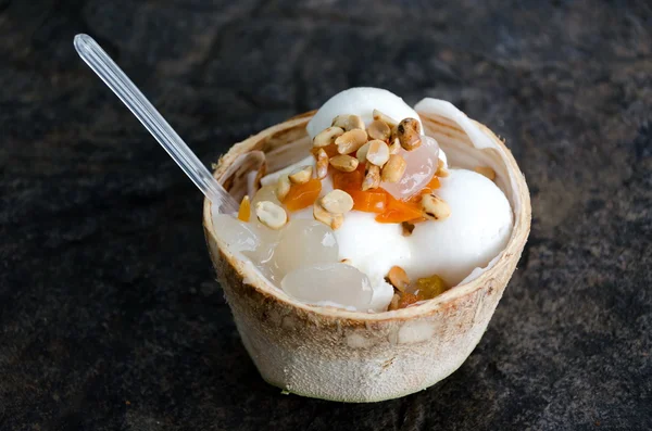 Coconut ice cream in Coconut shell.