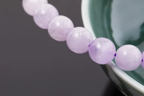 Purple bracelet made of glass stones