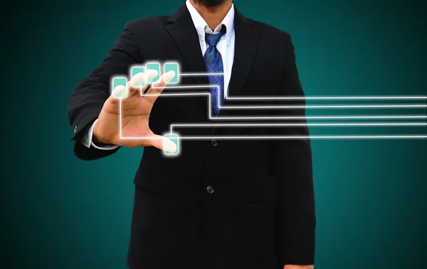 Businessman scanning of a finger on a touch screen interface