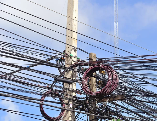 A pillar and a lot of confusing cables