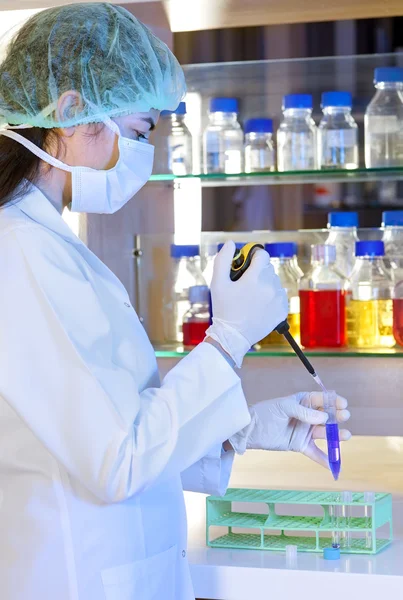 Female lab technician at work in a laboratory.