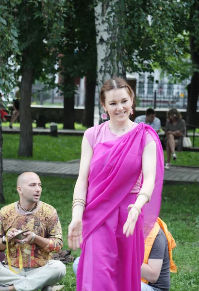 PERM, RUSSIA - JUN 10, 2012: Krishna worshipers dance and sing i