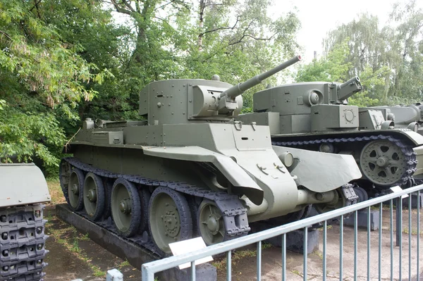 Soviet historical tanks BT-7 and T-28 in the Central Museum of the armed forces, side view