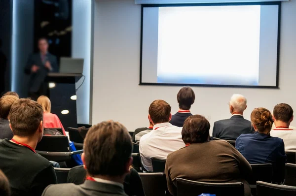 People sitting rear at the business conference and speaker