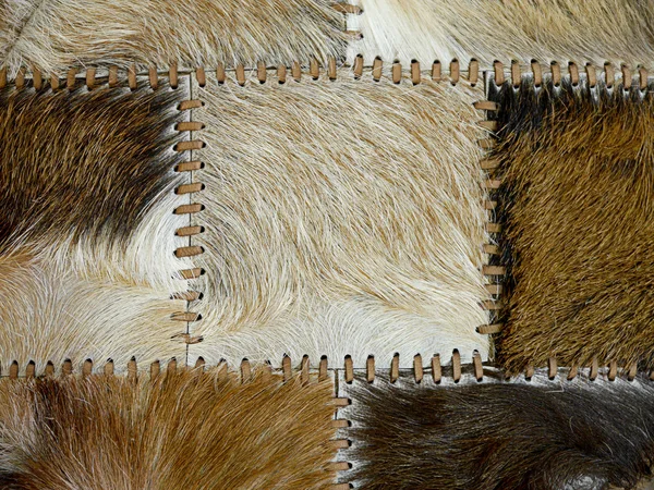 Stitched animal skins, decorative background