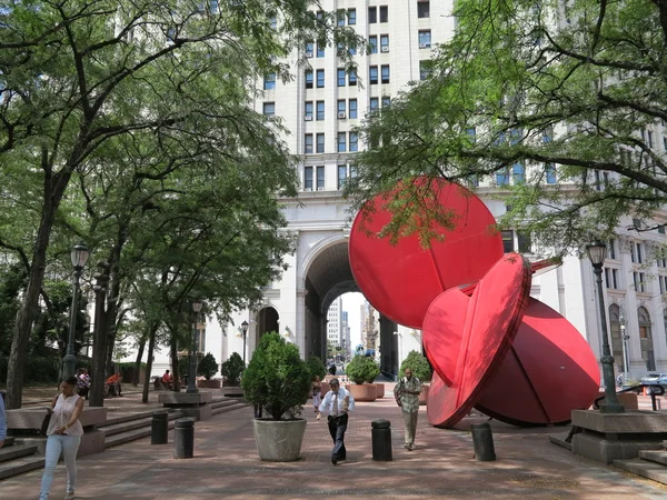 Art Statue near Municipal Building In New York City with People Taking a Break from work