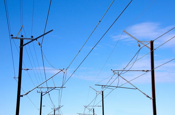 Overhead Power Lines Providing Power To Electric Trains