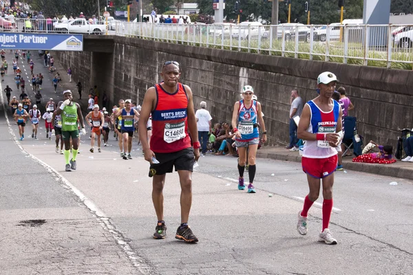 Runners Moving up Hill in Comrades Ultra Marathon