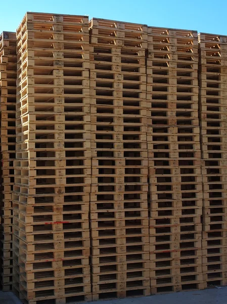 Stock of new wooden euro pallets at transportation company