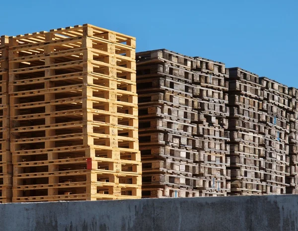 Stock of new wooden euro pallets at transportation company
