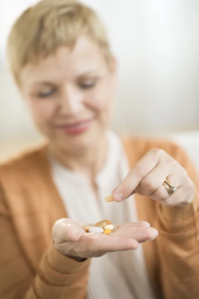 Woman Holding Prescription Medicine