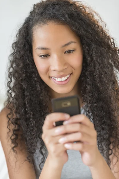 Girl Reading Text Message On Smart Phone