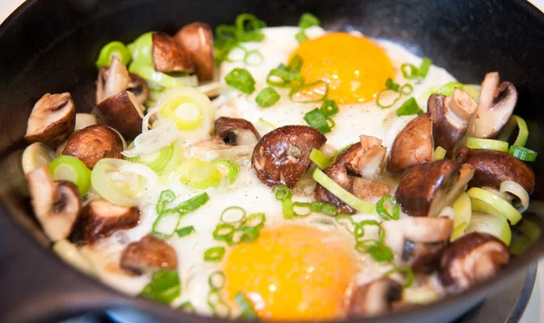 Fresh Organic Eggs Fried with Baby Portobello Mushrooms and Leeks