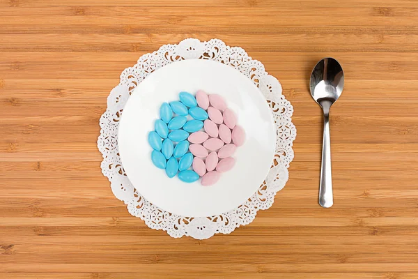 Colorful Pills on a saucer
